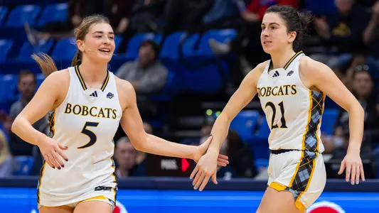 Jackie Grisdale and Paige Girardi High Five in Win Over Iona (Jan. 1, 2026 in Hamden, Conn.)