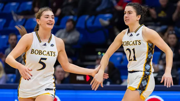 Jackie Grisdale and Paige Girardi High Five in Win Over Iona (Jan. 1, 2026 in Hamden, Conn.)