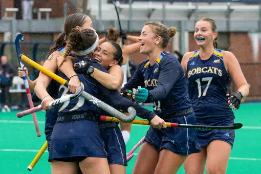 Group celebration after Charlie Caunter's OT goal against Dartmouth (Oct. 11, 2026 in Hamden, CT)
