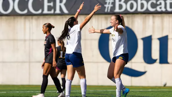 Isabella Torelli and Morgan Cupo Celebrate Goal in Win over Iona (Oct. 10 in Hamden, Conn)