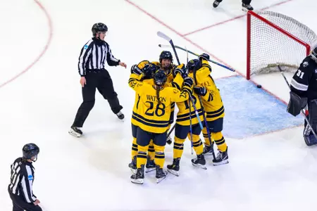 Group celebration after Peyton Cormier scores goal against Providence (Oct. 2, 2026 in Hamden, Conn.)