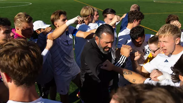 The Bobcats Break the Huddle After a Win over Mount (Oct. 24, 2026 in Hamden, Conn.)