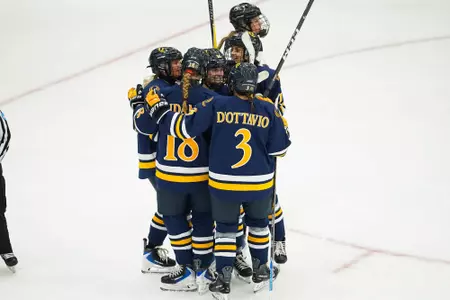 Alex Law goal celebration with group against Providence (Oct. 3 in Providence, RI)