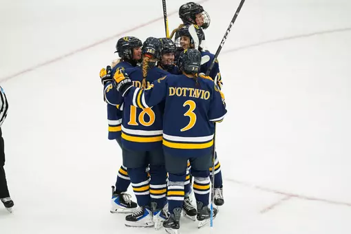 Alex Law goal celebration with group against Providence (Oct. 3 in Providence, RI)
