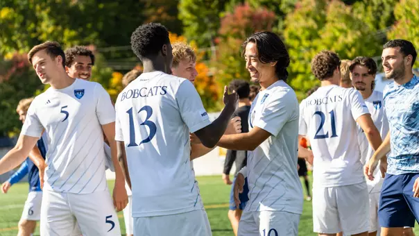 Taehyeon Lim and Cameron Brooks Celebrate After Quinnipiac's Win (Oct. 3, 2026 in Hamden, Conn.)