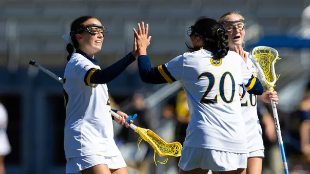 Emily Keegan and Mia Delmond Celebrate a Goal vs. Merrimack (April 16, 2025 in Hamden, Conn.)