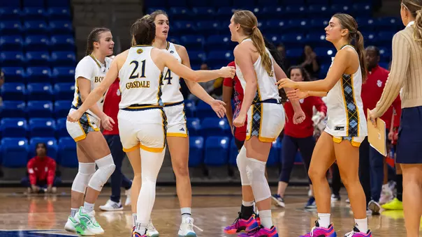 Women's Basketball High Fiving Against St. John's