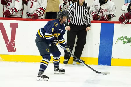 Taylor Brueske skating with the puck at Harvard (2.6.26 in Boston, Mass.)