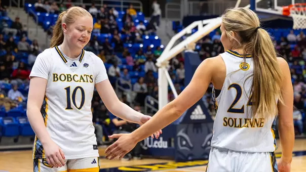 Maria Kealy and Ava Sollenne High Five