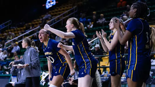WBB Bench Celebrates Win over George Mason (March 19, 2026 in Fairfax, VA)
