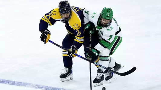Nate Tivey Battles for the Puck Against North Dakota (March 28, 2026 in Sioux Falls, SD)