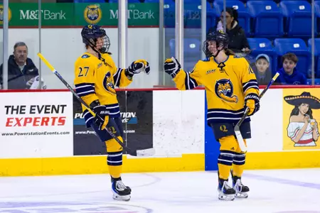 Ella Johnson and Avery Bairos Celebrate a Goal Against Brown (Feb. 27, 2026 in Hamden, Conn.)