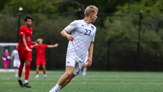 Benjamin Telle Eyes the Ball Against Stony Brook