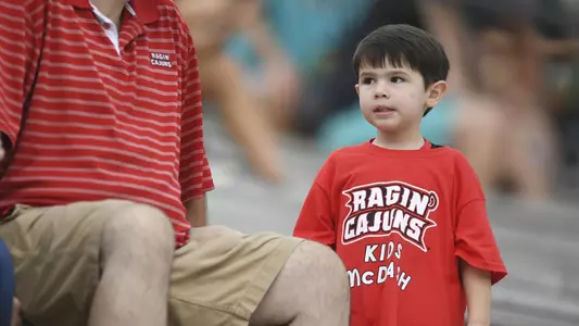 kid at football game