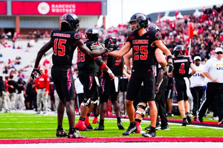 Peter LeBlanc and Robert Williams celebrate a touchdown October 7, 2023 Louisiana vs Texas State Football in Lafayette, LA at Cajun Field. Final score Louisiana 34 Texas State 30. Photo by Benjamin R. Massey/Ragin Cajun Athletics