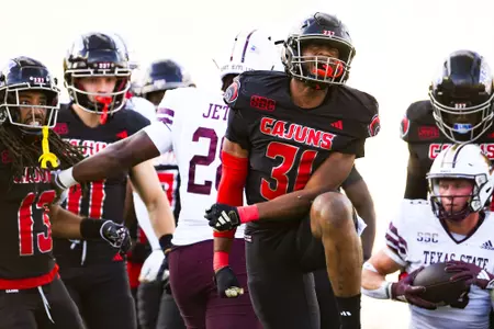 Trey Fitecelebrates a tackle October 7, 2023 Louisiana vs Texas State Football in Lafayette, LA at Cajun Field. Final score Louisiana 34 Texas State 30. Photo by Benjamin R. Massey/Ragin Cajun Athletics