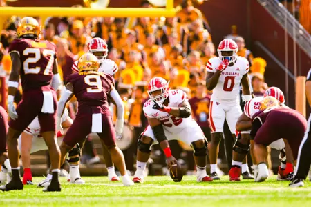 Landon Burton pre snap September 30, 2023 Louisiana @ University of Minnesota Football in Minneapolis, MN at Huntington Bank Stadium. Final score Louisiana 24 Minnesota 35. Photo by Benjamin R. Massey/Ragin Cajun Athletics