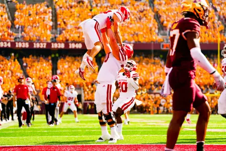 Peter LeBlanc celebrates touchdown with Jax Harrington September 30, 2023 Louisiana @ University of Minnesota Football in Minneapolis, MN at Huntington Bank Stadium. Final score Louisiana 24 Minnesota 35. Photo by Benjamin R. Massey/Ragin Cajun Athletics