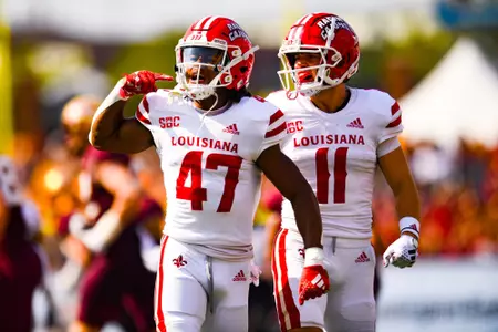Kerry Wilson celebrates making a tackle September 30, 2023 Louisiana @ University of Minnesota Football in Minneapolis, MN at Huntington Bank Stadium. Final score Louisiana 24 Minnesota 35. Photo by Benjamin R. Massey/Ragin Cajun Athletics