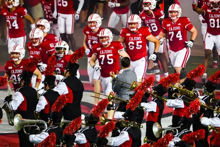 Team runs out of the tunnel October 21, 2023 Louisiana vs Georgia State Football in Lafayette, LA at Cajun Field. Final score Louisiana 17 Georgia State 20. Photo by Benjamin R. Massey/Ragin Cajun Athletics