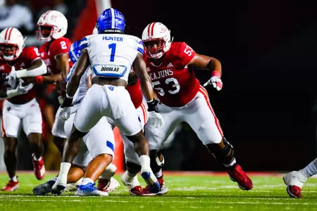 AJ Gillie makes a block October 21, 2023 Louisiana vs Georgia State Football in Lafayette, LA at Cajun Field. Final score Louisiana 17 Georgia State 20. Photo by Benjamin R. Massey/Ragin Cajun Athletics