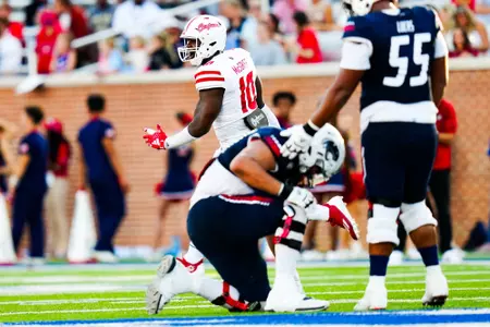 Nijel McGriff celebrates a fumble recovery as a South Alabama player gets up slowly October 28, 2023 Louisiana vs South Alabama Football in Mobile, AL at Hancock Whitney Bank Stadium. Final score Louisiana 33 South Alabama 20. Photo by Benjamin R. Massey/Ragin Cajun Athletics
