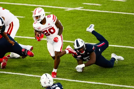 Dre’lyn Washington runs the ball October 28, 2023 Louisiana vs South Alabama Football in Mobile, AL at Hancock Whitney Bank Stadium. Final score Louisiana 33 South Alabama 20. Photo by Benjamin R. Massey/Ragin Cajun Athletics