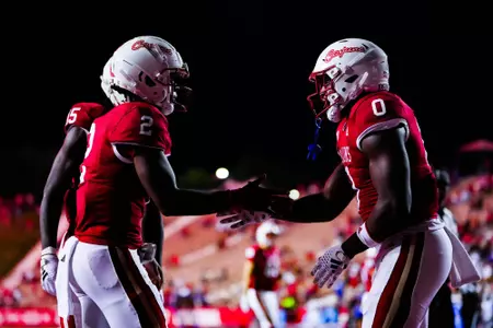 Jacob Kibodi celebrates a touchdown with Zeon Chriss October 21, 2023 Louisiana vs Georgia State Football in Lafayette, LA at Cajun Field. Final score Louisiana 17 Georgia State 20. Photo by Benjamin R. Massey/Ragin Cajun Athletics