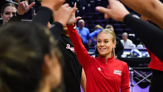 VB Kristi Gray in Team Huddle at LSU 9.6.23