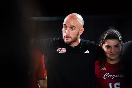 Chris McBride talks in the post game huddle October 26, 2023 Louisiana Women's Soccer vs Marshall in Lafayette, LA at Home Bank Track and Soccer Complex. Final Score Louisiana 1 Marshall 0. Photo by Benjamin R. Massey/Ragin Cajun Athletics