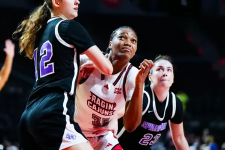 Wilnie Joseph box out November 6, 2023 Louisiana vs Spring Hill College Women's Basketball in Lafayette, LA at the Cajundome. Final score Louisiana 75 SHC 45. Photo by Benjamin R. Massey/Ragin Cajun Athletics