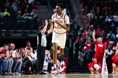 Joe Charles celebrates a three pointer November 6, 2023 Louisiana vs Youngstown State Men's Basketball in Lafayette, LA at the Cajundome. Final score Louisiana 72 YSU 62. Photo by Benjamin R. Massey/Ragin Cajun Athletics