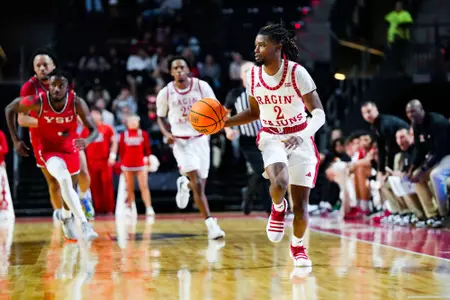 Michael Thomas dribbles November 6, 2023 Louisiana vs Youngstown State Men's Basketball in Lafayette, LA at the Cajundome. Final score Louisiana 72 YSU 62. Photo by Benjamin R. Massey/Ragin Cajun Athletics