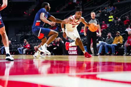 Themus Fulks dribbles October 30, 2023 Louisiana vs University of Texas at Tyler Men's Basketball in Lafayette, LA at the Cajundome. Final score Louisiana 80 UT Tyler 57. Photo by Benjamin R. Massey/Ragin Cajun Athletics