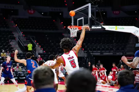 London Fields shoots October 30, 2023 Louisiana vs University of Texas at Tyler Men's Basketball in Lafayette, LA at the Cajundome. Final score Louisiana 80 UT Tyler 57. Photo by Benjamin R. Massey/Ragin Cajun Athletics