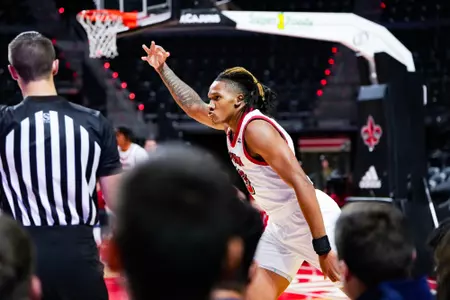 Brandon Hardy celebrates a three pointer October 30, 2023 Louisiana vs University of Texas at Tyler Men's Basketball in Lafayette, LA at the Cajundome. Final score Louisiana 80 UT Tyler 57. Photo by Benjamin R. Massey/Ragin Cajun Athletics