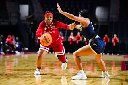 Brandi Williams dribbles November 12, 2023 Louisiana vs Kent State Women's Basketball in Lafayette, LA at the Cajundome. Final score Louisiana 55 Kent State 64. Photo by Benjamin R. Massey/Ragin Cajun Athletics