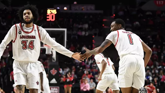 01/26/2023 Louisiana vs Troy MBB. Final score Louisiana 72 Troy 57. Photo by Benjamin R. Massey. About photo: Terence Lewis II and Joe Charles celebrates against Troy.