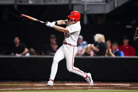 Connor Higgs swings at ball against BYU February 22, 2023 Louisiana vs Brigham Young Baseball in Lafayette, LA at Russo Park at M.L. "Tigue" Moore Field. Final Score Louisiana 4 BYU 3. Photo by Benjamin R. Massey/Ragin Cajuns Athletics