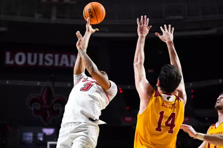 Chancellor White lays the ball up against ULM 16 February, 2023 Louisiana vs ULM MBB in Lafayette, LA at the Cajundome. Final score Louisiana 82 Louisiana Monroe 67. Photo by Benjamin R. Massey/Ragin Cajun Athletics