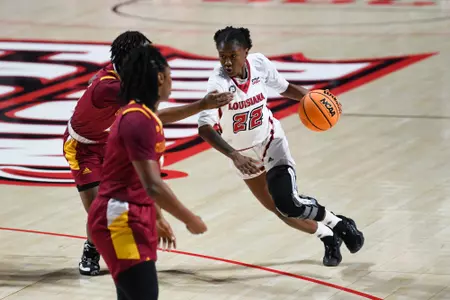 Jaylyn James dribbles the ball against Louisiana-Monroe February 2, 2023 Louisiana vs Louisiana Monroe WBB in Lafayette, LA at the Cajundome. Final score Louisiana 66 ULM 58. Photo by Benjamin R. Massy/Ragin Cajun Athletics