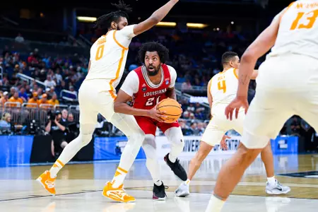Jordan Brown posts up March 16, 2023. Louisiana vs Tennessee in the NCAA Tournament First Round at the Amway Center in Orlando, FL. Final score Louisiana 52 Tennessee 55. Photo by Benjamin R. Massey/Ragin Cajuns Athletics.
