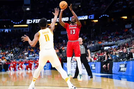 Greg Williams, Jr. shoots the ball against Tennessee March 16, 2023. Louisiana vs Tennessee in the NCAA Tournament First Round at the Amway Center in Orlando, FL. Final score Louisiana 52 Tennessee 55. Photo by Benjamin R. Massey/Ragin Cajuns Athletics.