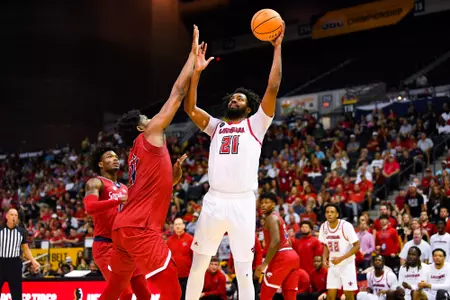 Jordan Brown lays the ball up against South Alabama March 3, 2023 Louisiana defeats South Alabama for their first Sun Belt Conference Tournament title since 2014. Pensacola, FL SBC Tournament. Final score 71 USA 66. Photo by Benjamin R. Masssey/Ragin Cajun Athletics