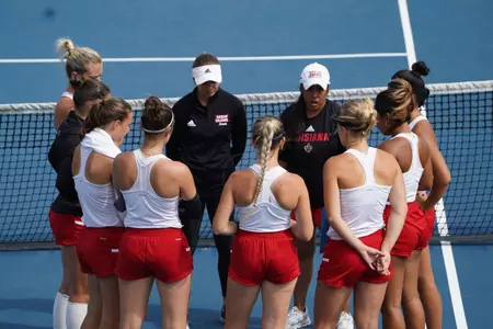 Women's Tennis meeting during their match against Marshall - 4/2
