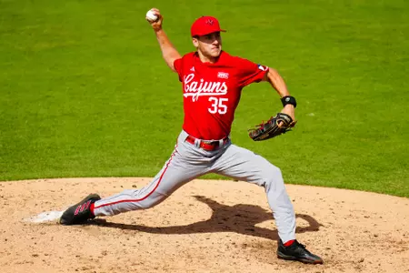 Jackson Nezuh pitches the ball to Texas June 2, 2023 Louisiana vs Texas Baseball in the 2023 Coral Gables Regional Opening game at Alex Rodriguez Field in Miami, FL. Final Score Louisiana 2 Texas 4. Photo by Benjamin R. Massey/Ragin Cajun Athletics