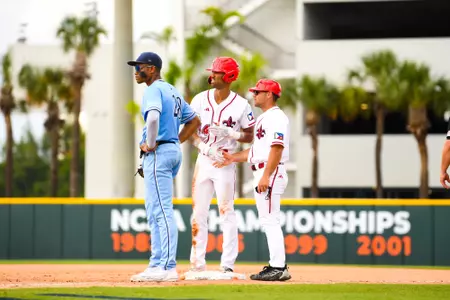 CJ Willis talks to Zach LaFleur June 3, 2023 Louisiana vs Maine Baseball in the 2023 Coral Gables Regional Elimaination Game at Alex Rodriguez Field in Miami, FL. Final Score Louisiana 19 Maine 10. Photo by Benjamin R. Massey/Ragin Cajun Athletics