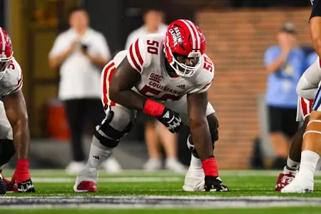 Nathan Thomas pre snap September 9, 2023 Louisiana @ Old Dominion University Football in Northfolk, VA at S.B. Ballard Stadium. Final score Louisiana 31 ODU 38. Photo by Benjamin R. Massey/Ragin Cajun Athletics