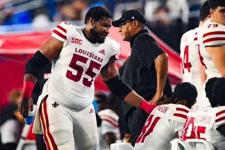 Landon Burton on the sideline in the rain September 9, 2023 Louisiana @ Old Dominion University Football in Northfolk, VA at S.B. Ballard Stadium. Final score Louisiana 31 ODU 38. Photo by Benjamin R. Massey/Ragin Cajun Athletics