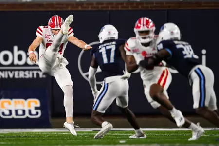 Thomas Leo punts the ball September 9, 2023 Louisiana @ Old Dominion University Football in Northfolk, VA at S.B. Ballard Stadium. Final score Louisiana 31 ODU 38. Photo by Benjamin R. Massey/Ragin Cajun Athletics